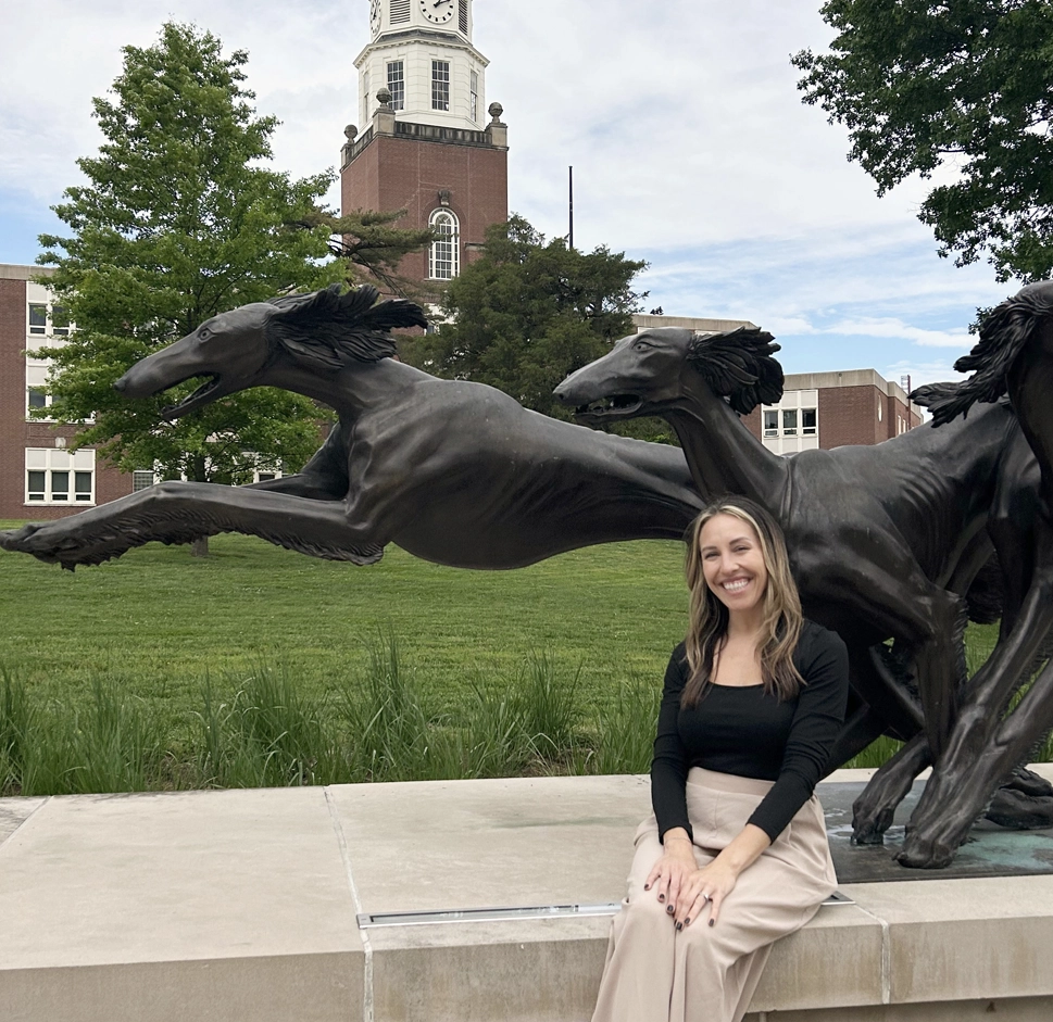 Steph Baril, Student Success Coach sitting